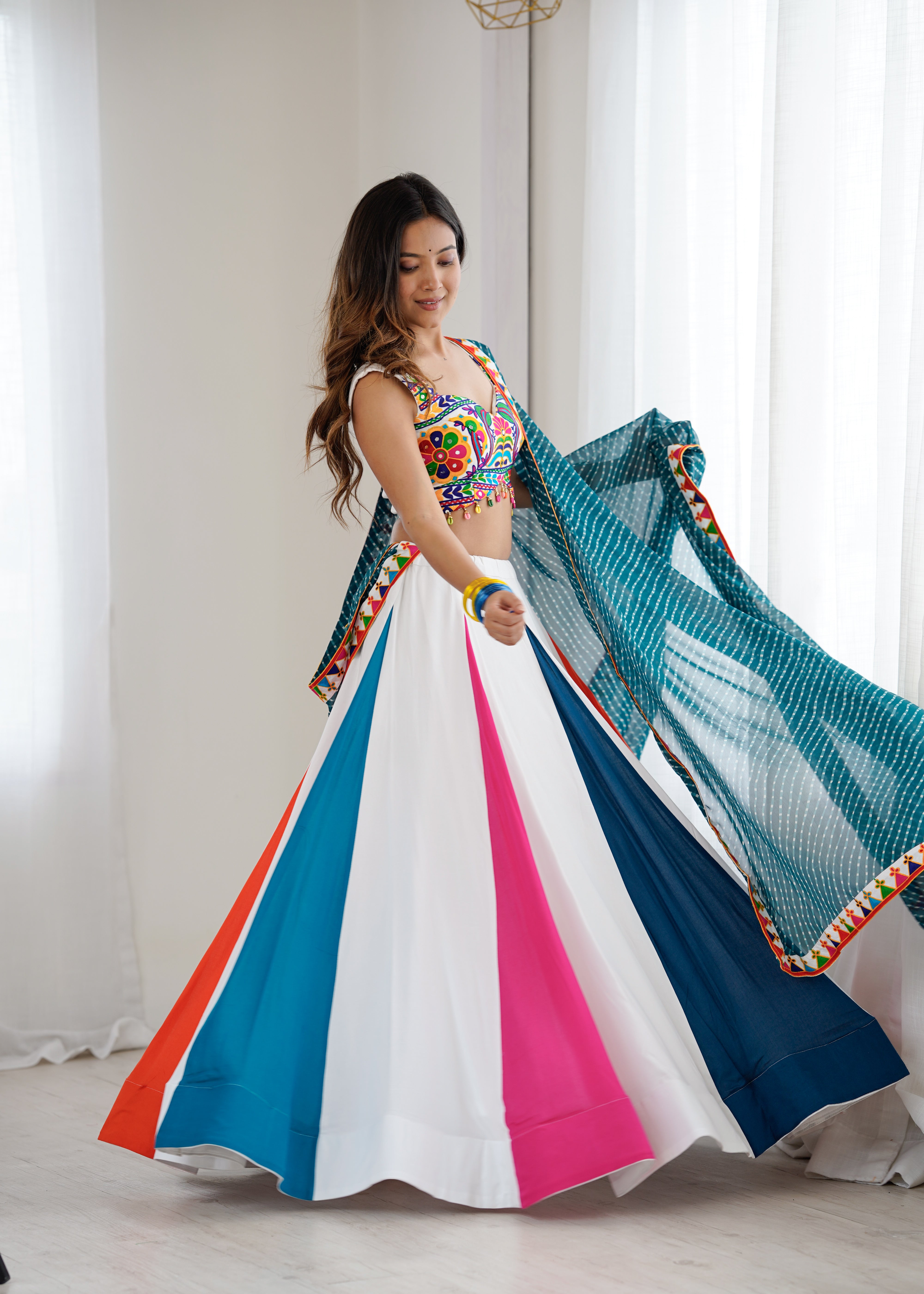 Navrang Gamthi Mirror Work Heavy Rayon Lehenga Choli with Dupatta