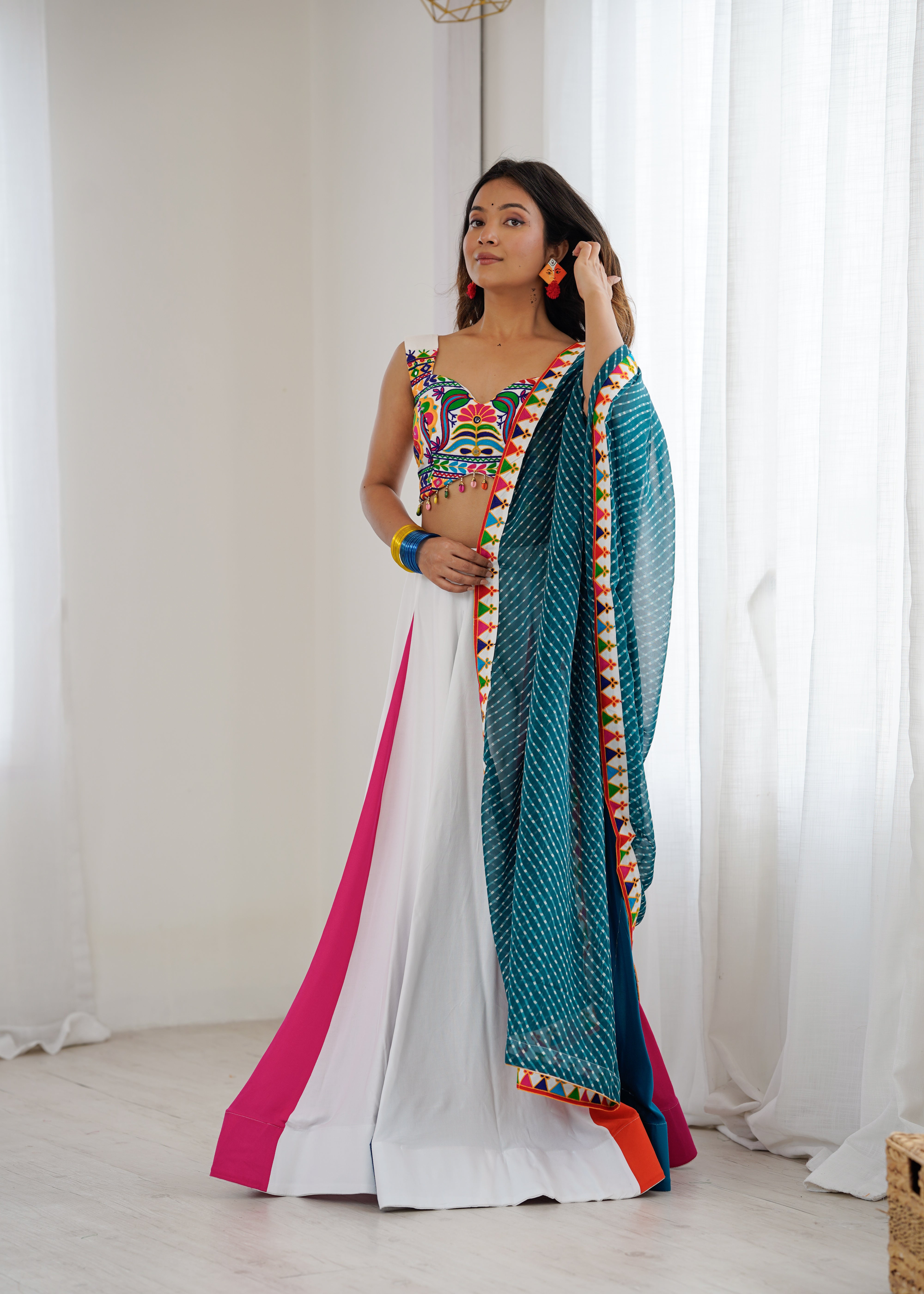 Navrang Gamthi Mirror Work Heavy Rayon Lehenga Choli with Dupatta