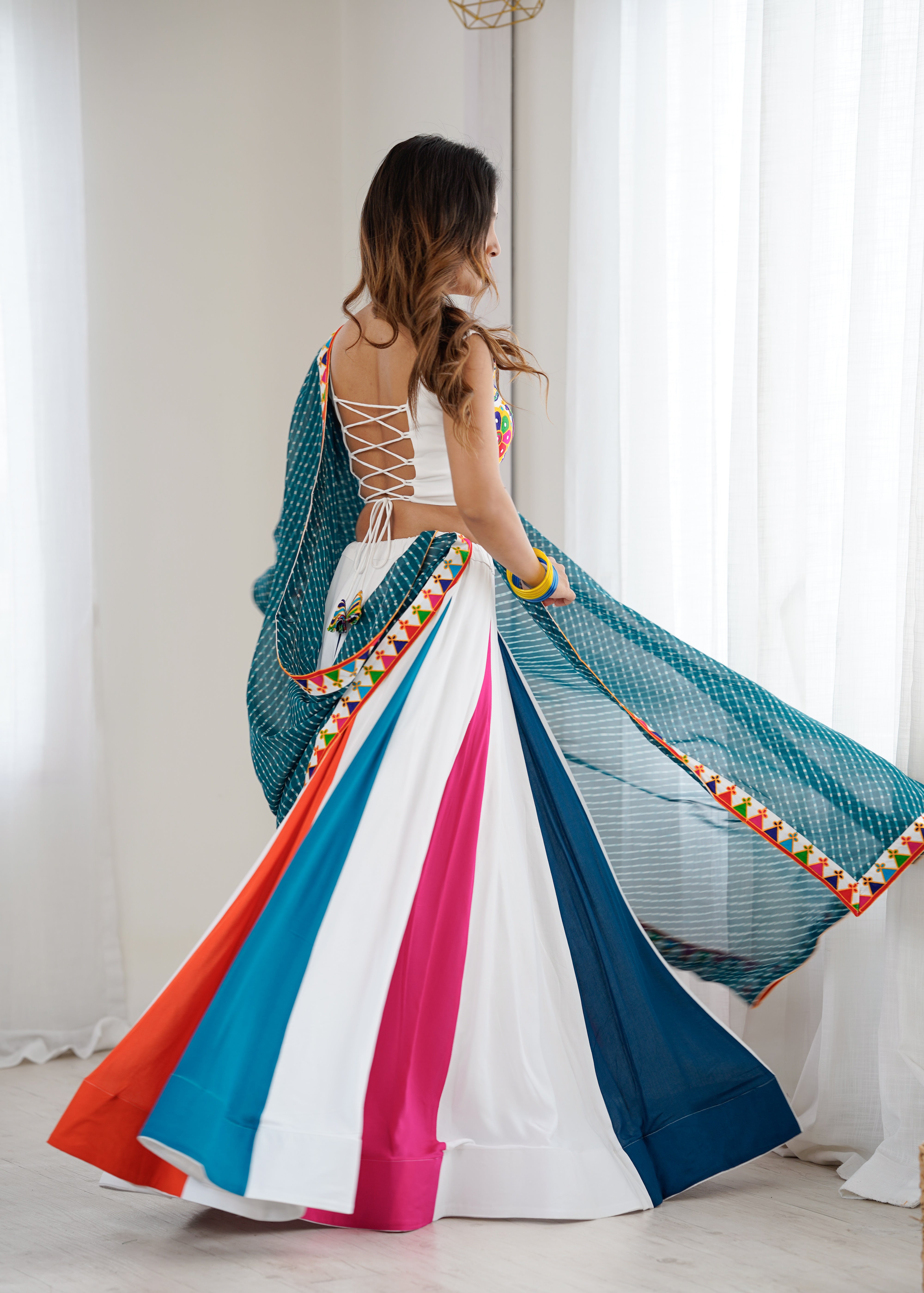 Navrang Gamthi Mirror Work Heavy Rayon Lehenga Choli with Dupatta