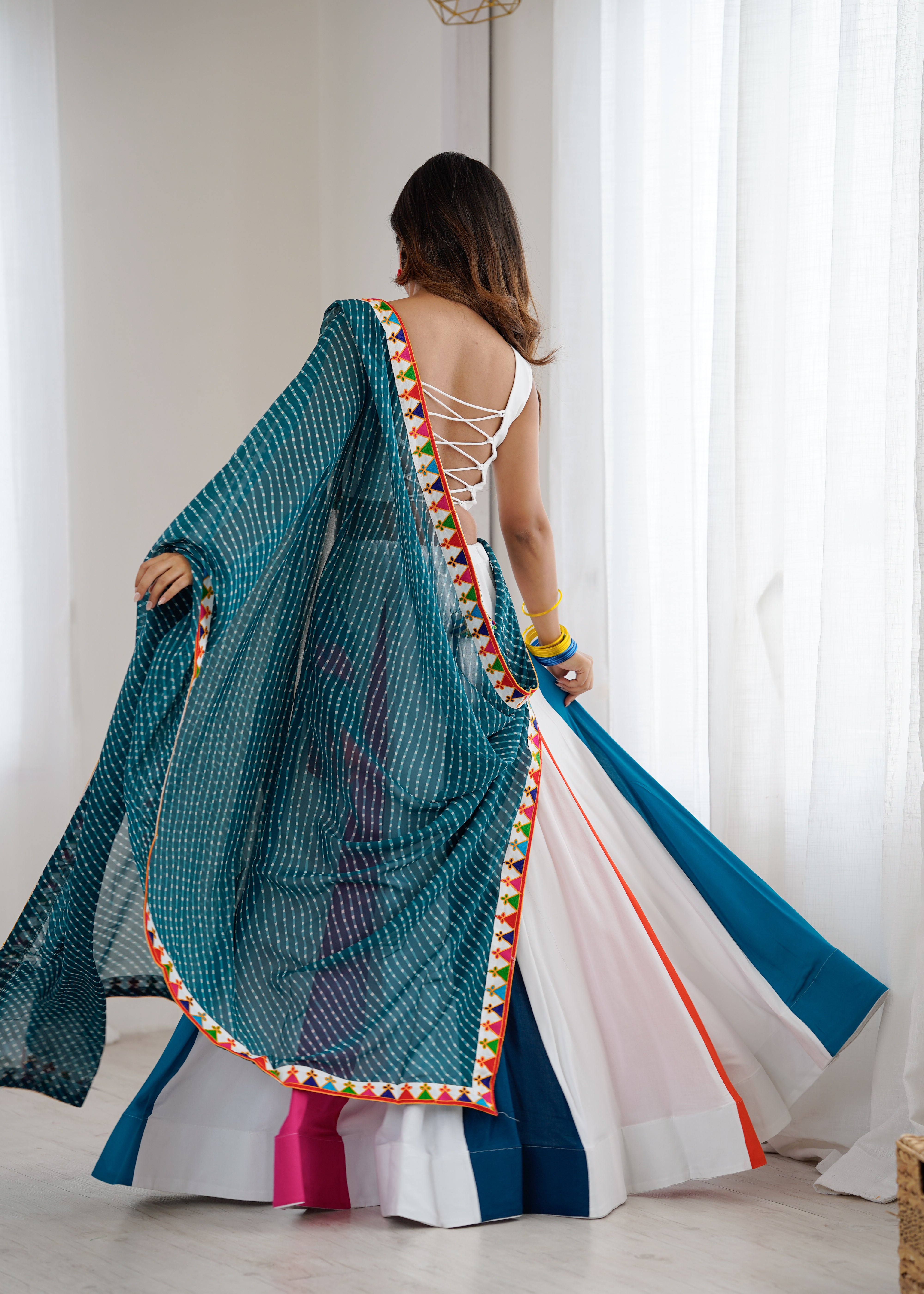 Navrang Gamthi Mirror Work Heavy Rayon Lehenga Choli with Dupatta