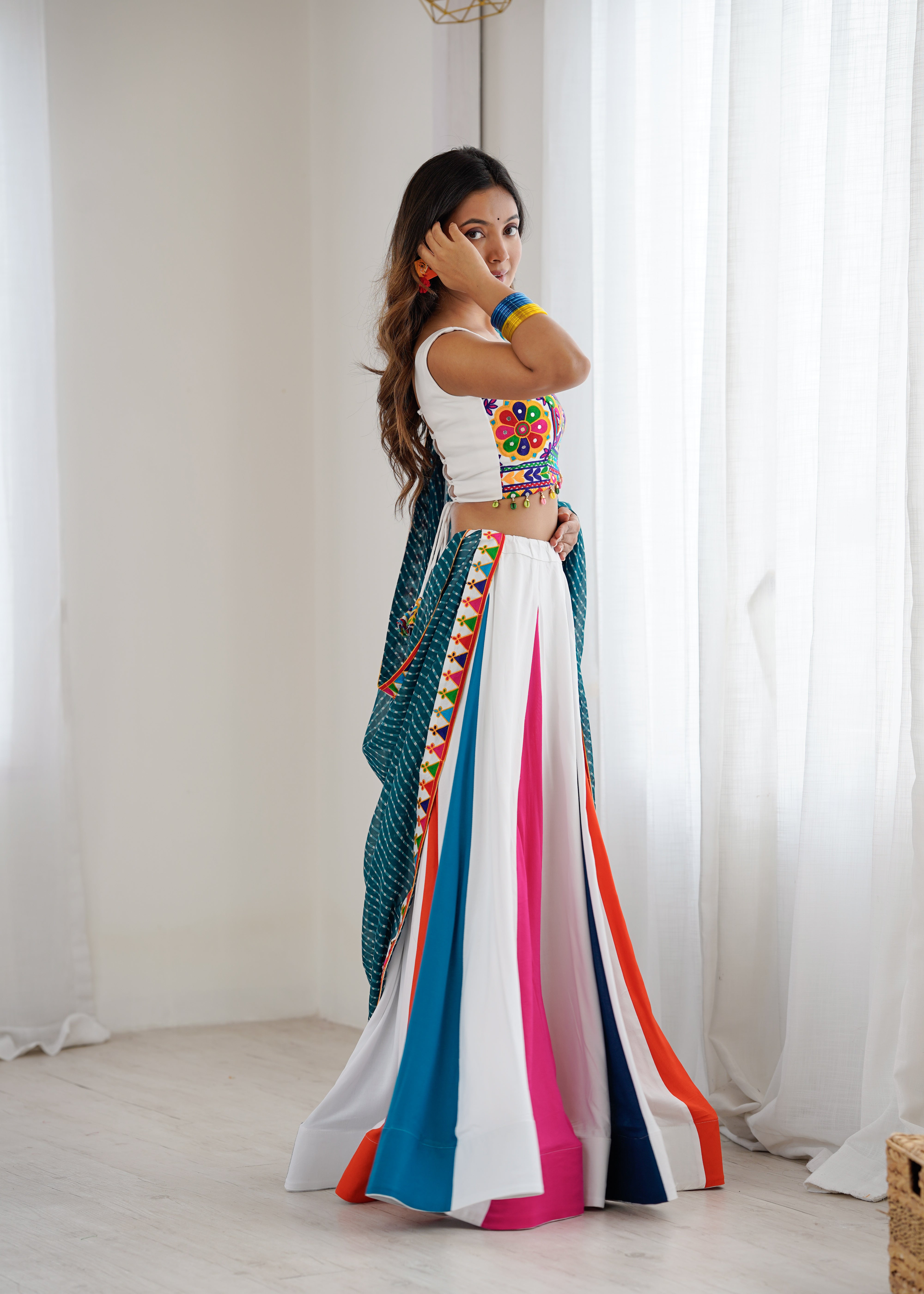 Navrang Gamthi Mirror Work Heavy Rayon Lehenga Choli with Dupatta