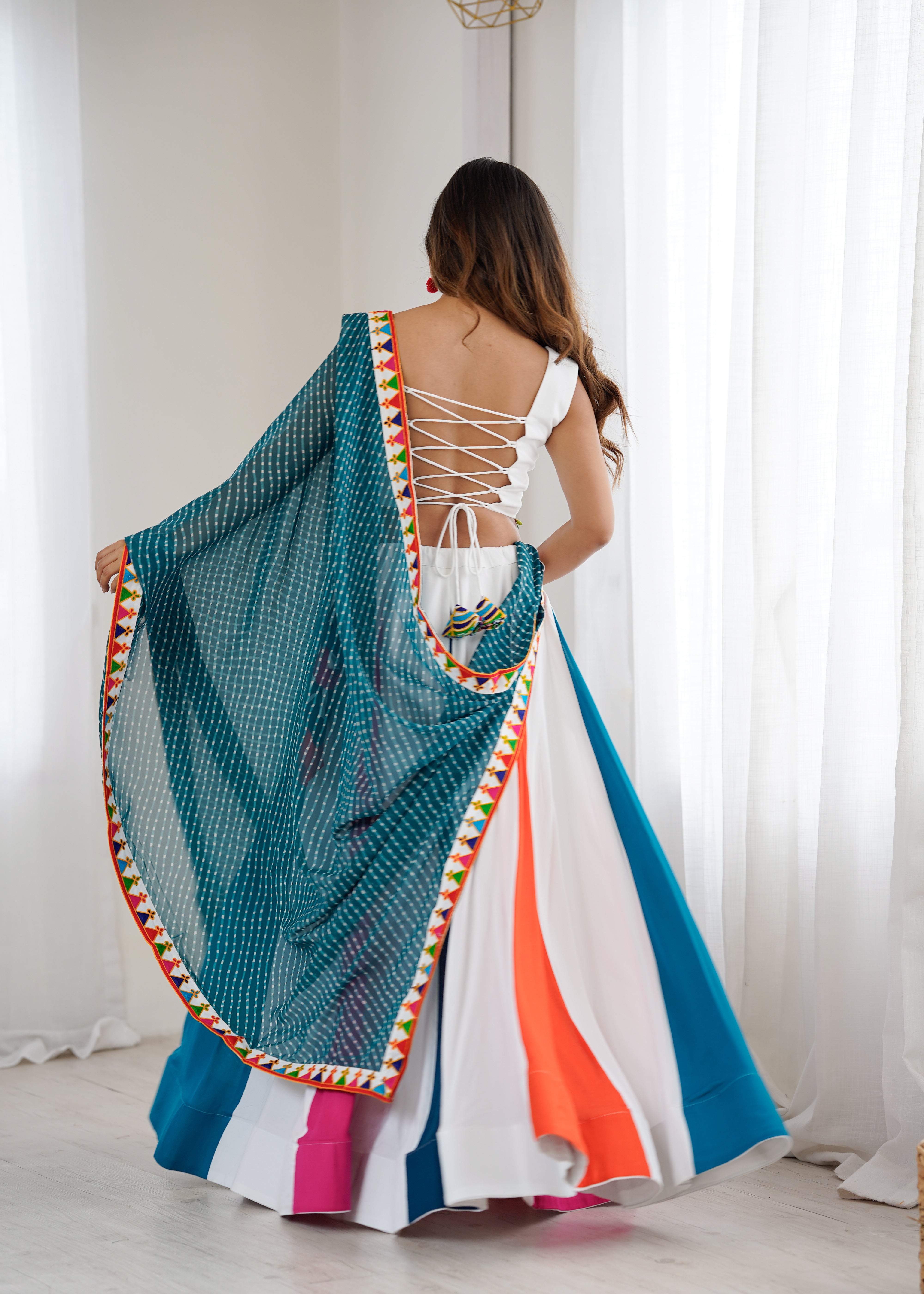 Navrang Gamthi Mirror Work Heavy Rayon Lehenga Choli with Dupatta