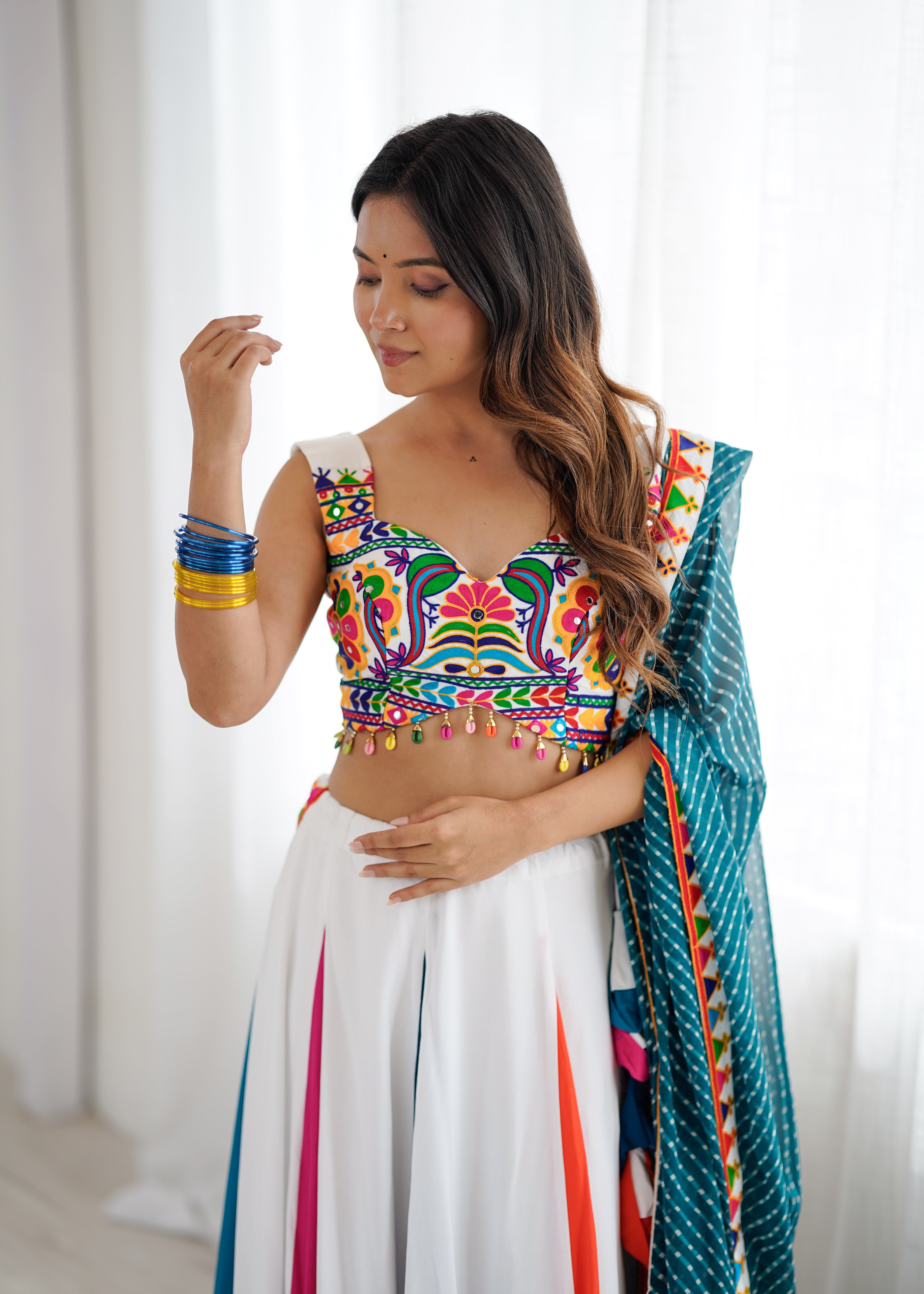 Navrang Gamthi Mirror Work Heavy Rayon Lehenga Choli with Dupatta