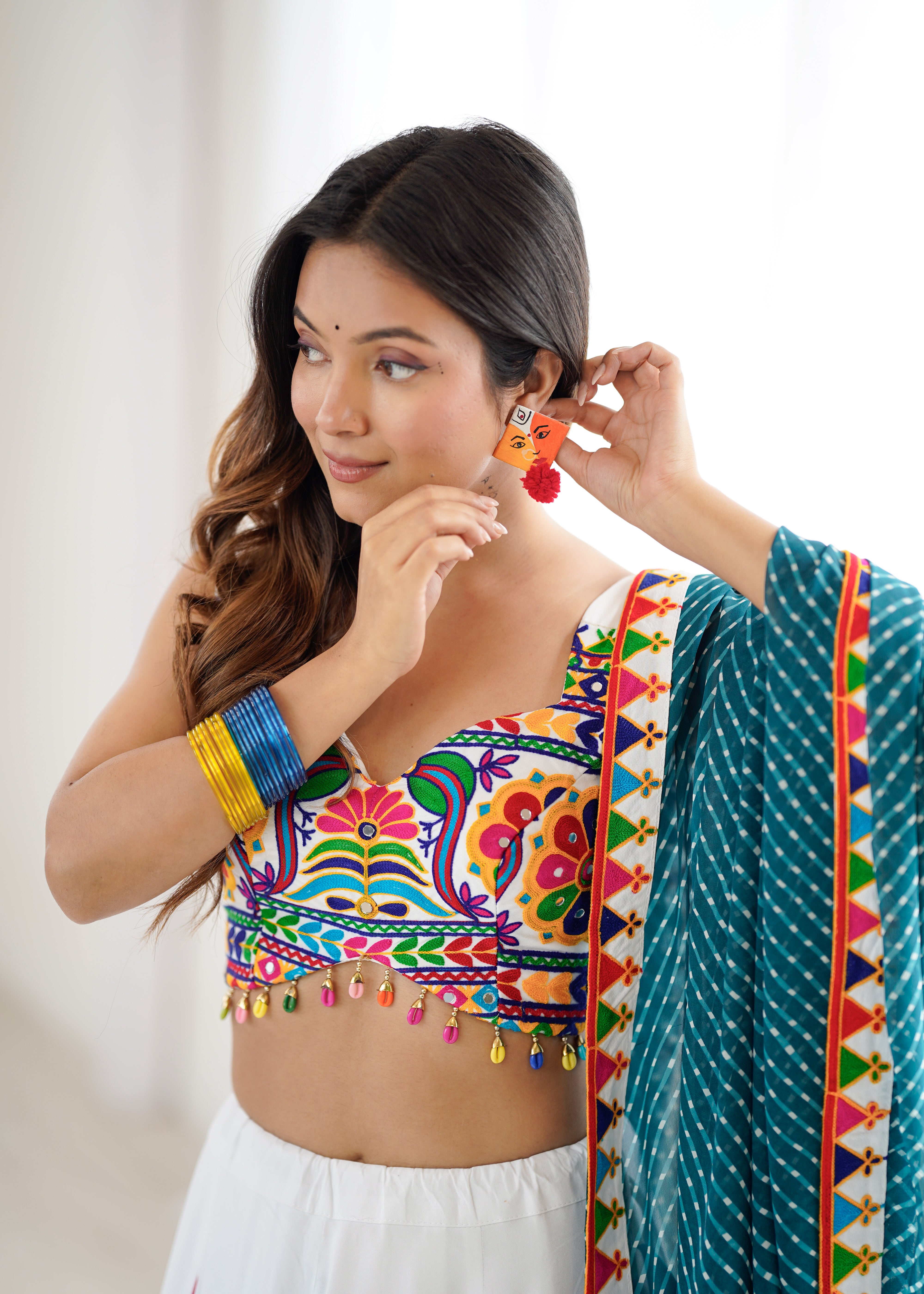 Navrang Gamthi Mirror Work Heavy Rayon Lehenga Choli with Dupatta